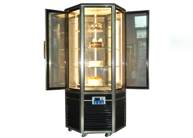 Refrigerador giratorio vertical 4~8℃ de la exhibición de la torta de la puerta del escaparate de cristal hexagonal de la torta